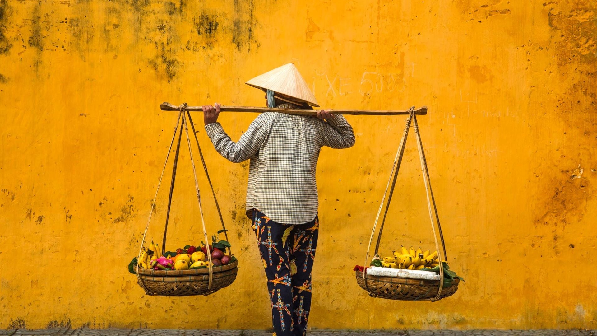 séjour vietnam cambodge, hoi an, marchande ambulante